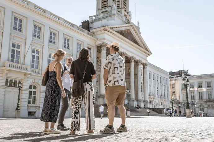 Karel explaining Brussels architecture to a small group of guests